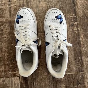 Drips creations white sneakers with hand painted butterflies.  Size 9 women shoe